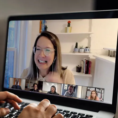 Live virtual coaching session for product management teams on a video call